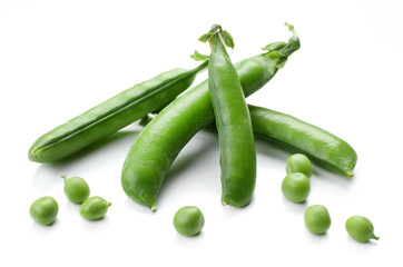 Fresh green peas isolated on white