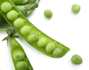 Fresh green peas isolated on white