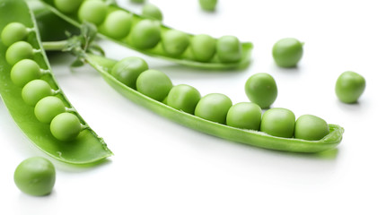 Fresh green peas isolated on white