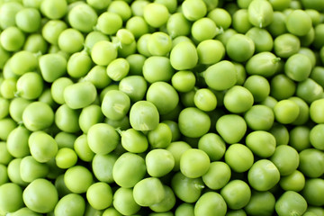 Heap of fresh green peas close up