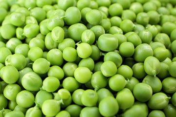 Heap of fresh green peas close up