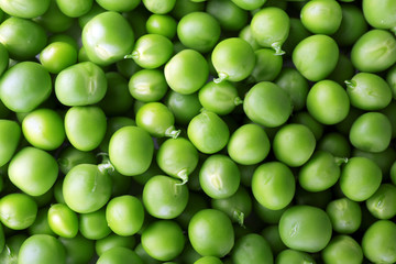 Heap of fresh green peas close up