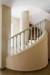 Naklejka premium Spiral stairs in old manor