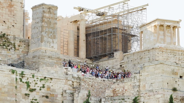 Crowds of tourists climb the Acropolis, time lapse