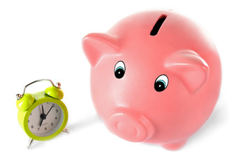 Piggy bank with alarm clock isolated on white