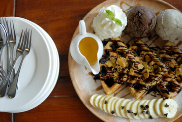 Waffle with chocolate cream and ice cream
