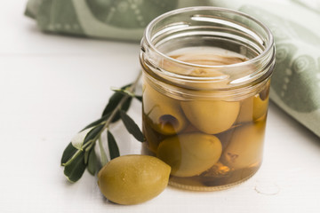 pickled olives and olive tree branch
