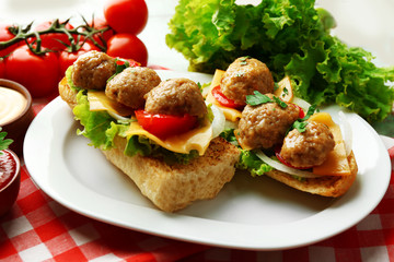 Meatball Sandwiches on wooden table background