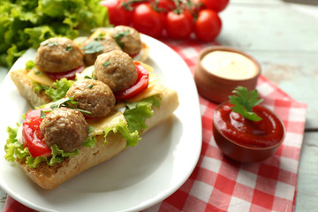Meatball Sandwiches on wooden table background