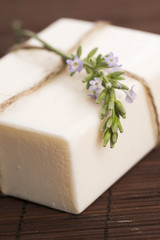 Fototapeta na wymiar Lavender soap with lavender flowers
