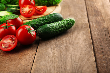 Fresh vegetables on wooden background