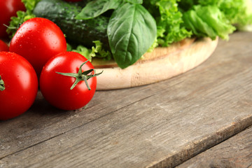 Fresh vegetables on wooden table, closeup