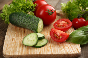 Fresh vegetables on wooden table, closeup