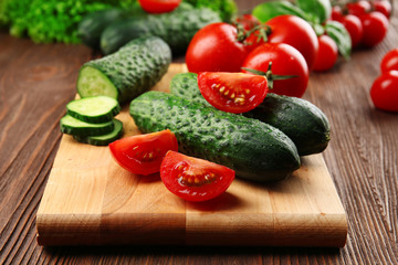 Fresh vegetables on wooden table, closeup