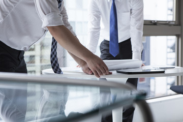 Businessmen have spread documents