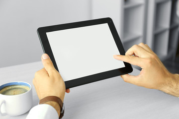 Man working with tablet in office
