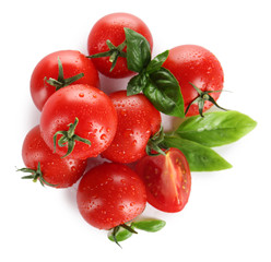 Cherry tomatoes with basil isolated on white