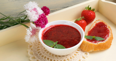 Canned strawberry confiture and jam sandwich