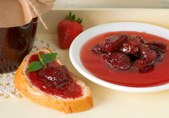 Canned strawberry confiture and jam sandwich