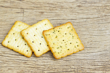 Crackers on wooden table