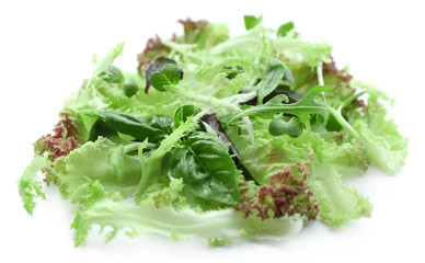 Fresh mixed green salad isolated on white