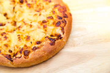 Pizza on wooden background