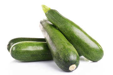 Fresh zucchini isolated on white