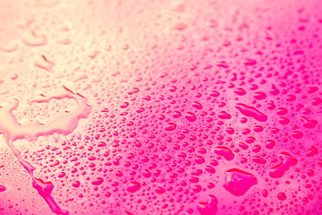 Drops of water on red  floor