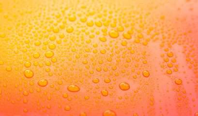 Drops of water on yellow floor