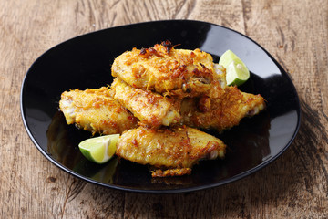 chicken wings roasted with turmeric and herbs