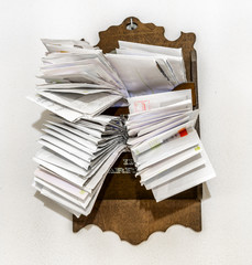 bunches of old bills and accounts  in dusty original envelopes
