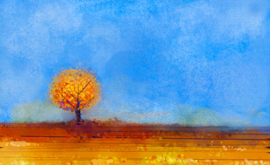 Abstract landscape, tree and field oil painting. Yellow,orange,red color and blue sky of falling season © nongkran_ch
