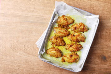 chicken wings roasted with turmeric and herbs