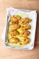 chicken wings roasted with turmeric and herbs