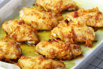 chicken wings roasted with turmeric and herbs