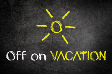 Off on Vacation Concept on Black Chalkboard