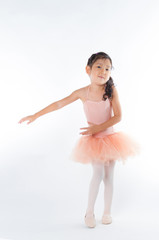 Naklejka premium A little ballerina in the studio. On White Background