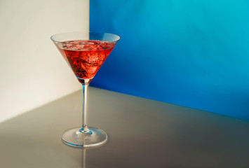 Wineglass with the wine and ice