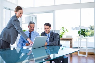 Business people working on laptop computer 