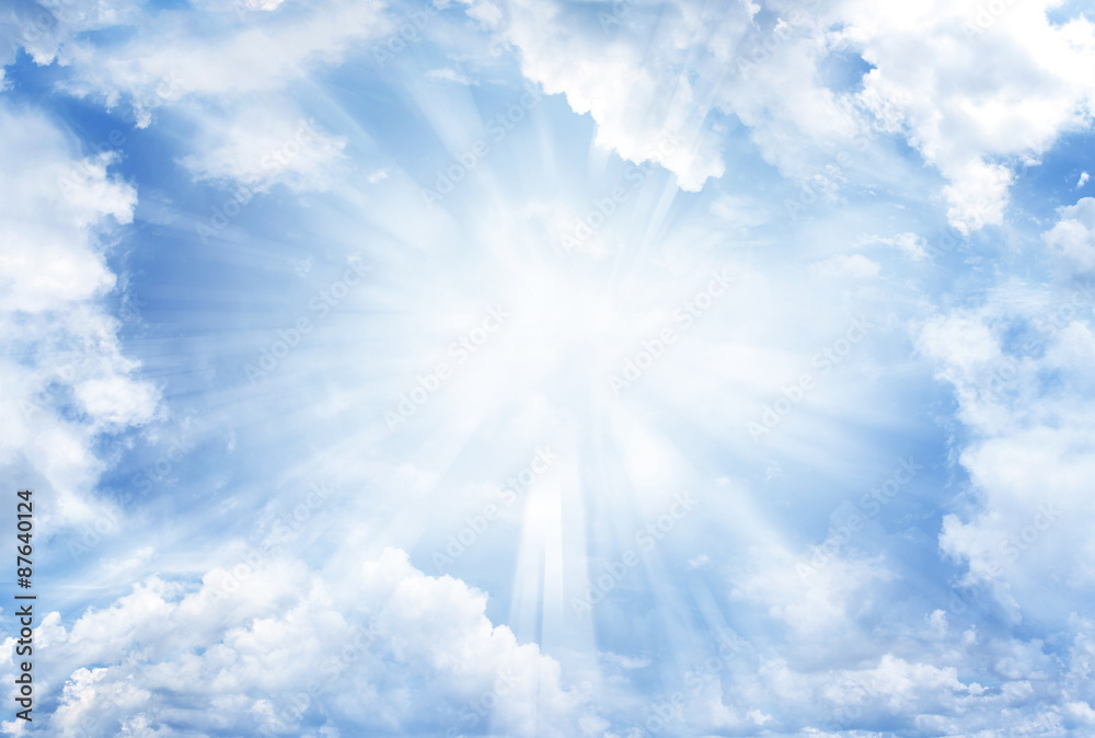 Wall mural bright rays of light in blue sky - Wall murals
