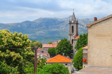 Fototapeta premium Corsican landscape, old houses and bell tower