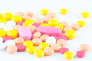 different color tablets of medicine