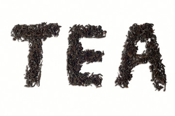 Tea word on a dry tea isolated on the white background