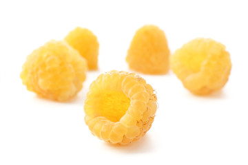 Yellow raspberries isolated on white