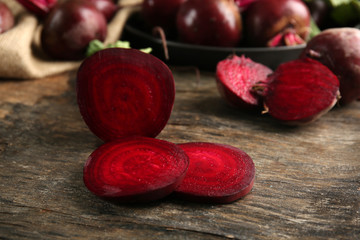 Young beets on wooden table close up