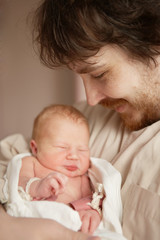 The newborn girl and her father
