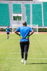 Goal keeper waiting , back view
