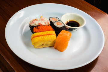 Five Sushi on white dish