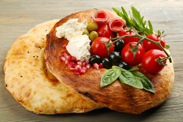 Ingredients of Mediterranean cuisine, on wooden background