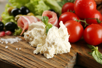 Ingredients of Mediterranean cuisine, on wooden board, close-up